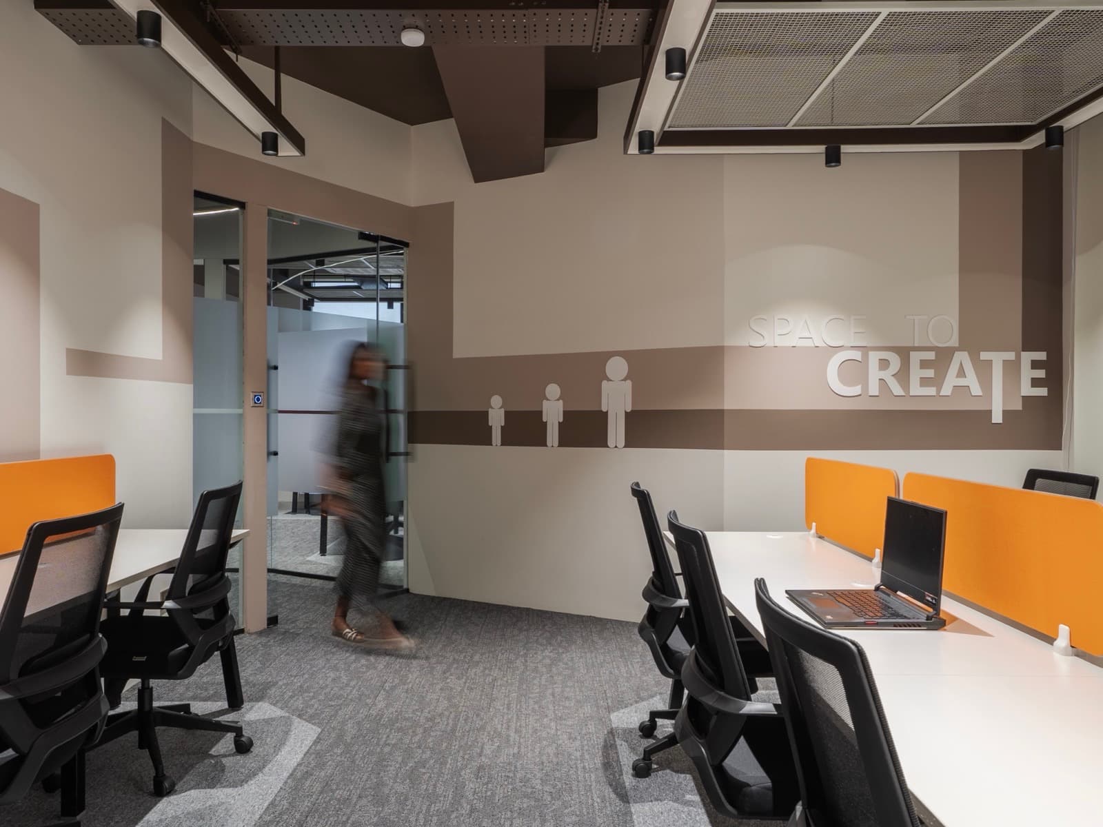 Space To Create mural and twin desk rows in the 12 seater lake view private office at Fliqzo