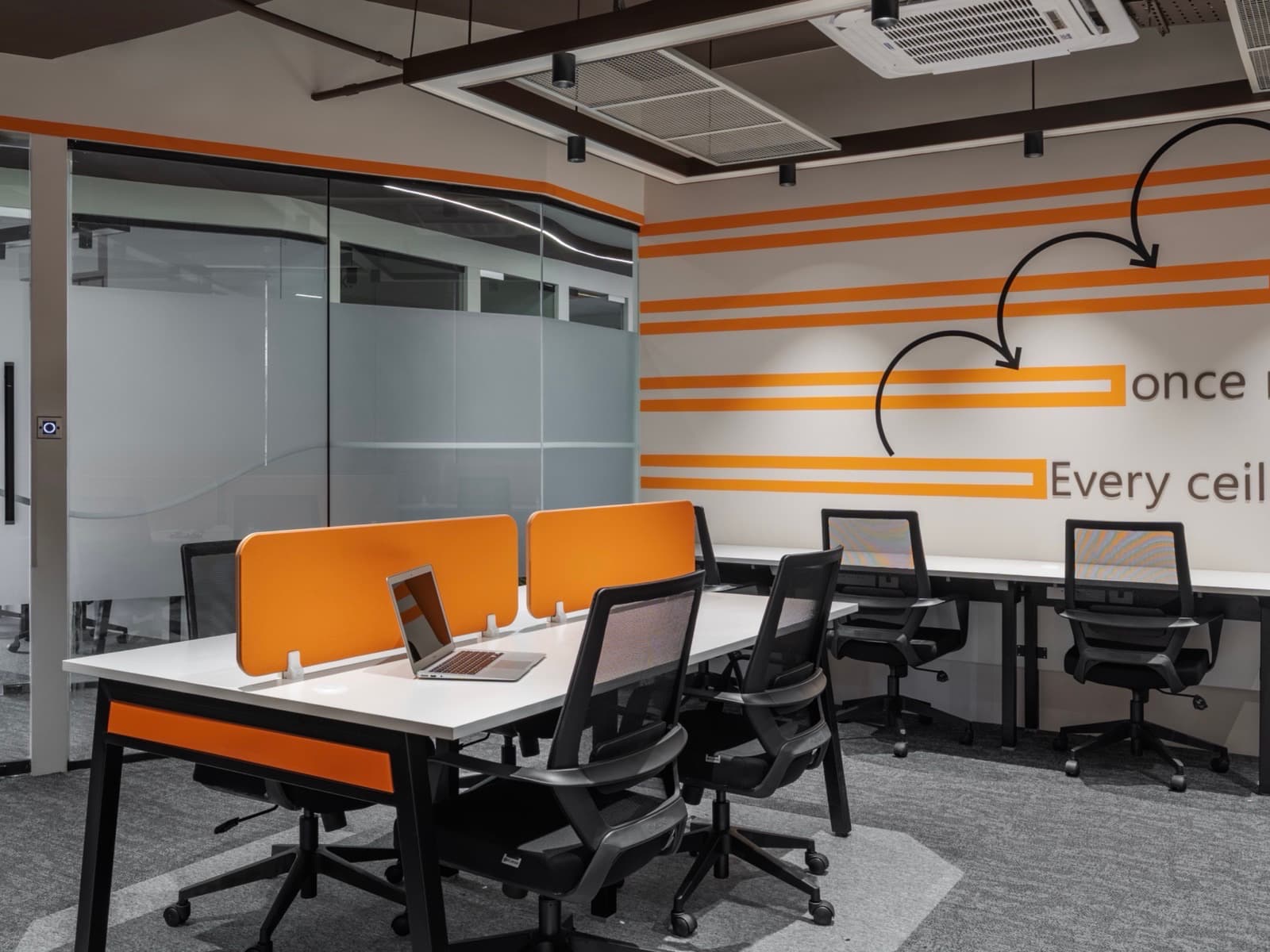 New Floor mural and glass partition across the 16 seater private office at Fliqzo Coimbatore